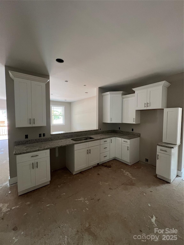 1987 Robert Rufty Ln, Catawba, NC 28609 - kitchen featuring white cabinets, dark countertops, and a sink