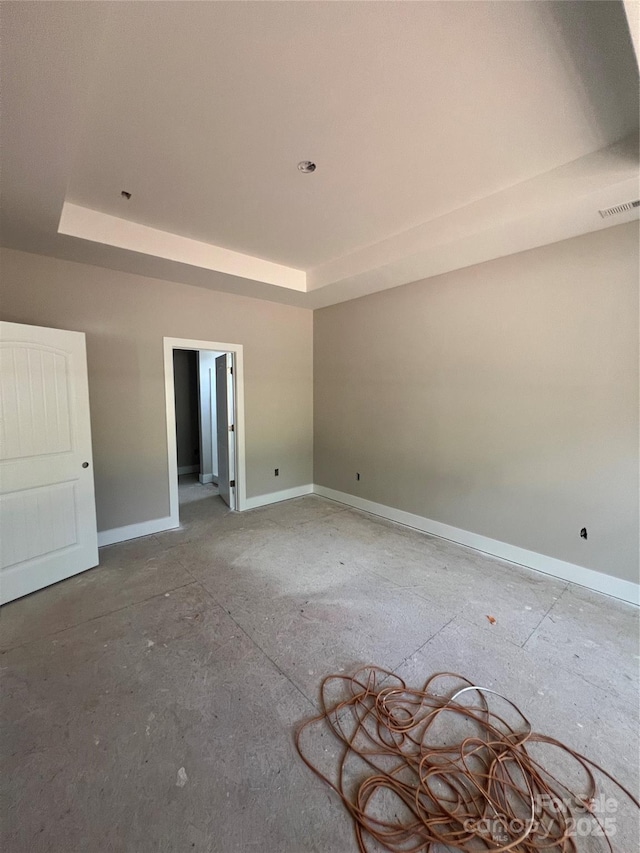 1987 Robert Rufty Ln, Catawba, NC 28609 - spare room featuring a tray ceiling and baseboards
