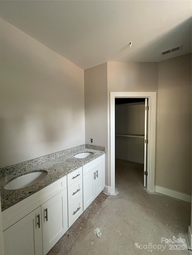 1987 Robert Rufty Ln, Catawba, NC 28609 - bathroom featuring double vanity and baseboards