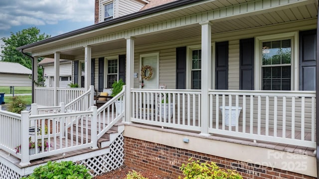 139 Pleasant Garden Dr, Taylorsville, NC 28681 - view of exterior entry featuring covered porch