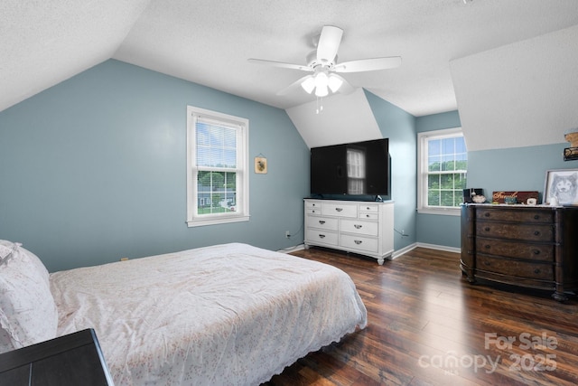 139 Pleasant Garden Dr, Taylorsville, NC 28681 - bedroom featuring lofted ceiling, wood finished floors, a textured ceiling, baseboards, and ceiling fan