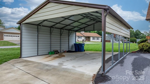 139 Pleasant Garden Dr, Taylorsville, NC 28681 - view of parking featuring a detached carport and concrete driveway