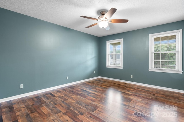 139 Pleasant Garden Dr, Taylorsville, NC 28681 - empty room with a ceiling fan, wood finished floors, baseboards, and a textured ceiling