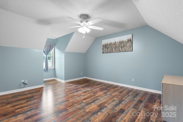 139 Pleasant Garden Dr, Taylorsville, NC 28681 - additional living space featuring ceiling fan, a textured ceiling, lofted ceiling, wood finished floors, and baseboards