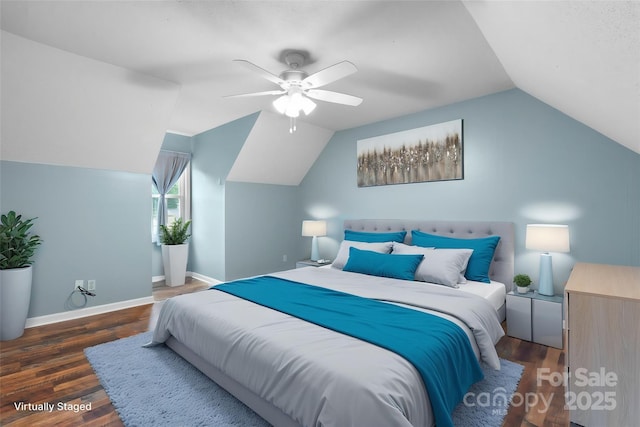 139 Pleasant Garden Dr, Taylorsville, NC 28681 - bedroom with vaulted ceiling, wood finished floors, baseboards, and ceiling fan