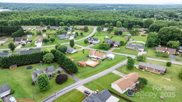 139 Pleasant Garden Dr, Taylorsville, NC 28681 - aerial perspective of suburban area featuring a heavily wooded area