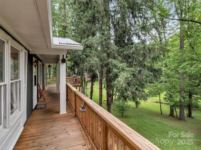 49 Trimont Mountain Trl, Franklin, NC 28734 - deck featuring a lawn and view of scattered trees