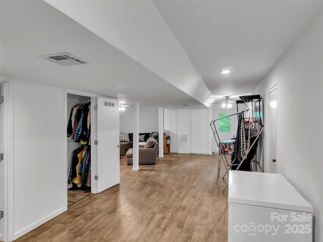 49 Trimont Mountain Trl, Franklin, NC 28734 - below grade area featuring light wood-style floors and baseboards