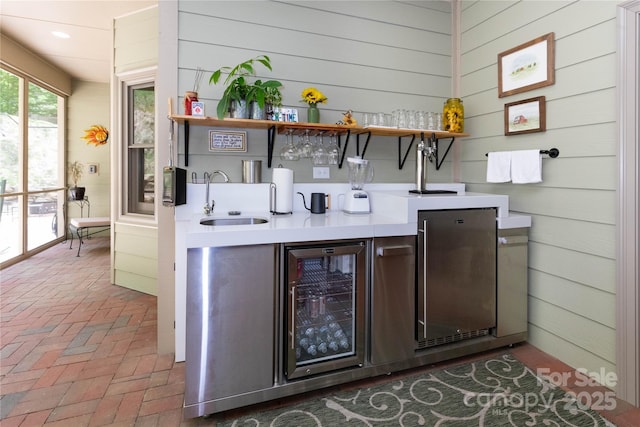 33 Freedom Dr, Waynesville, NC 28786 - indoor wet bar with wine cooler, brick flooring, wooden walls, and recessed lighting