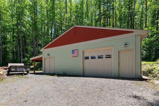 33 Freedom Dr, Waynesville, NC 28786 - detached garage featuring a wooded view