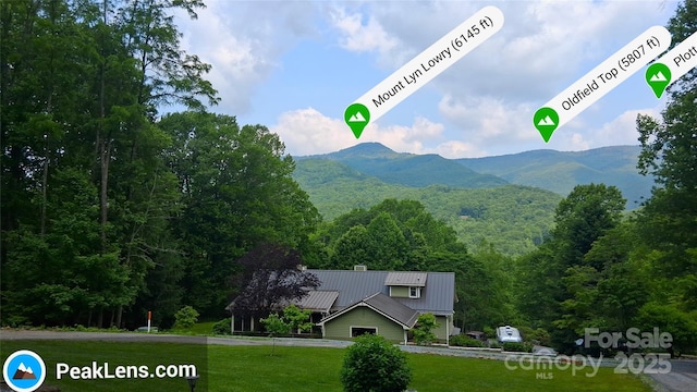 33 Freedom Dr, Waynesville, NC 28786 - view of mountain backdrop with a heavily wooded area