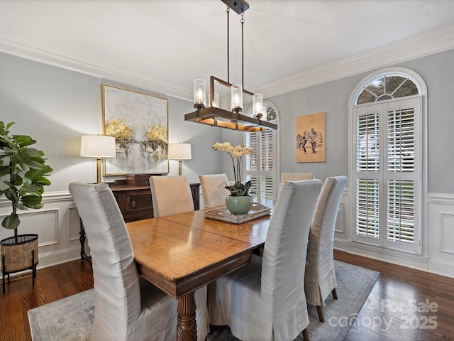 16308 Woolwine Rd, Charlotte, NC 28278 - dining room with a decorative wall, ornamental molding, a chandelier, wood finished floors, and healthy amount of natural light