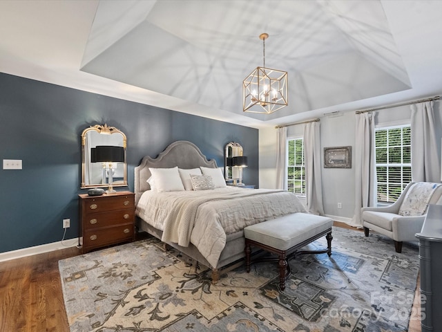 16308 Woolwine Rd, Charlotte, NC 28278 - bedroom featuring a tray ceiling, a chandelier, and baseboards