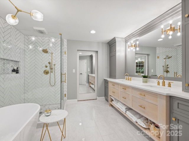 16308 Woolwine Rd, Charlotte, NC 28278 - full bathroom with double vanity, a freestanding bath, a shower stall, and tile patterned flooring