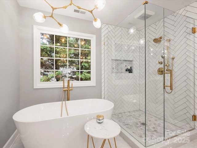 16308 Woolwine Rd, Charlotte, NC 28278 - bathroom with a soaking tub and a stall shower