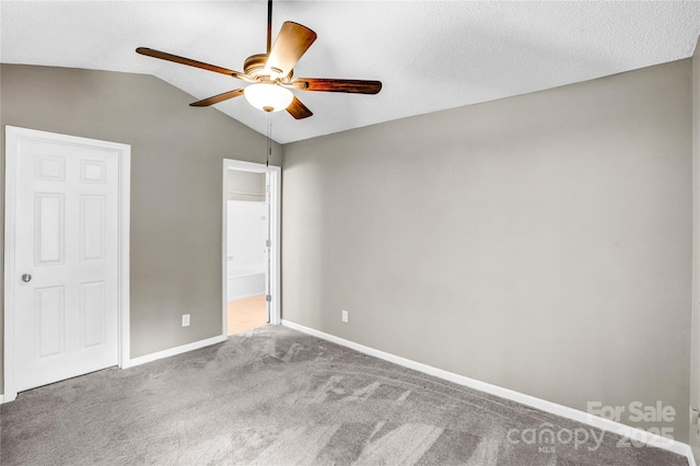 753 SW Dr, Davidson, NC 28036 - unfurnished bedroom featuring vaulted ceiling, carpet flooring, baseboards, and ceiling fan