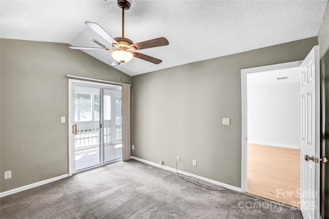 753 SW Dr, Davidson, NC 28036 - unfurnished room with a ceiling fan, a textured ceiling, baseboards, carpet, and lofted ceiling