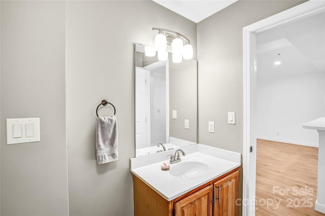 753 SW Dr, Davidson, NC 28036 - bathroom with vanity and wood finished floors