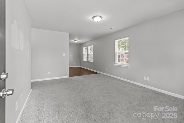 252 Sweet Bay Ln NW, Concord, NC 28027 - unfurnished room featuring dark carpet and baseboards