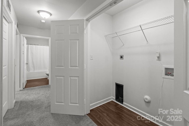 252 Sweet Bay Ln NW, Concord, NC 28027 - laundry area with attic access, hookup for a washing machine, baseboards, and dark wood-style flooring
