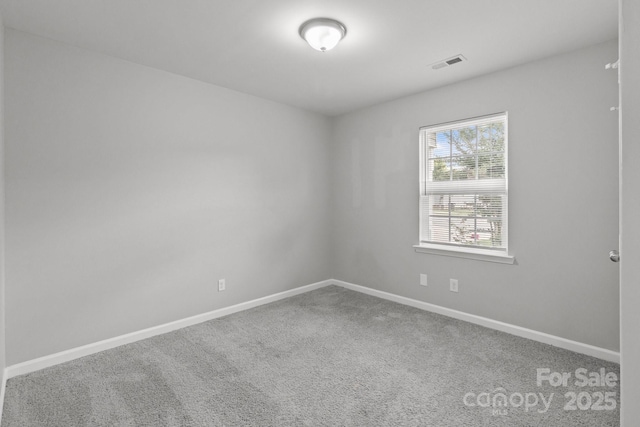 252 Sweet Bay Ln NW, Concord, NC 28027 - carpeted spare room featuring baseboards