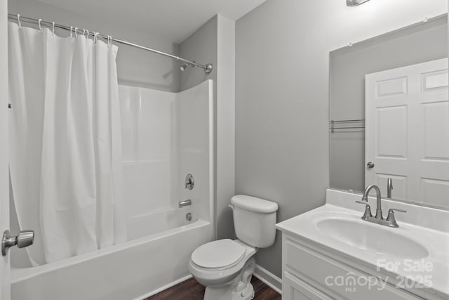 252 Sweet Bay Ln NW, Concord, NC 28027 - full bathroom with toilet, wood finished floors, shower / bath combo, vanity, and baseboards