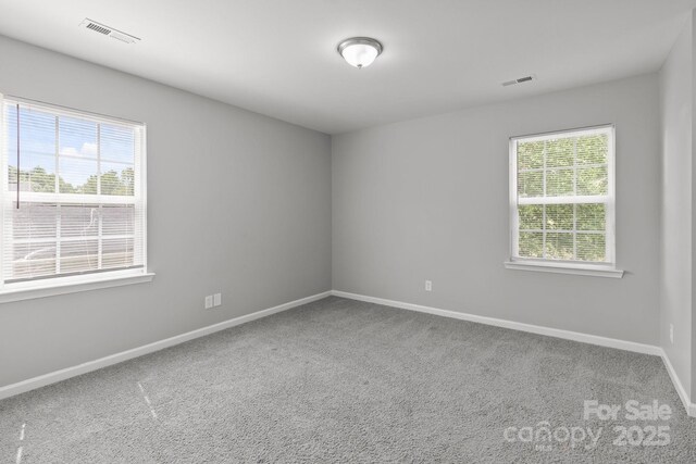 252 Sweet Bay Ln NW, Concord, NC 28027 - empty room featuring baseboards and carpet flooring