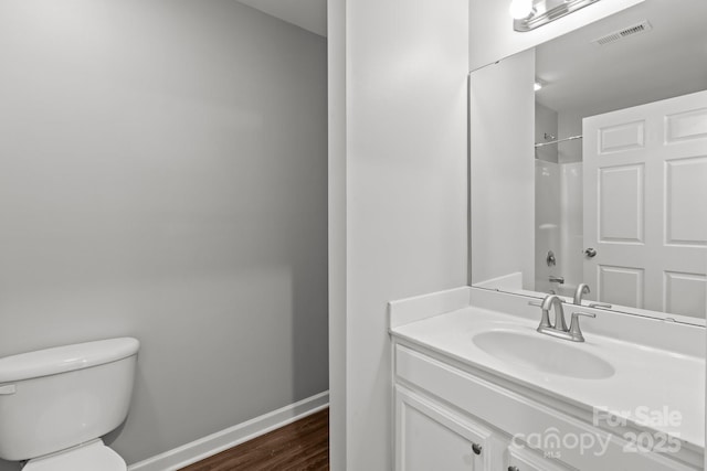 252 Sweet Bay Ln NW, Concord, NC 28027 - bathroom featuring toilet, baseboards, wood finished floors, vanity, and a shower