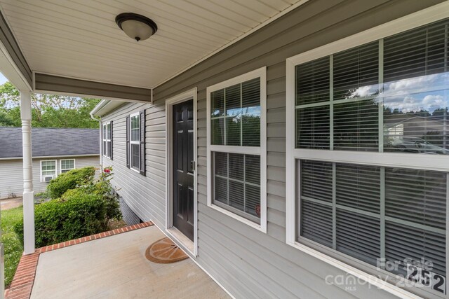 252 Sweet Bay Ln NW, Concord, NC 28027 - view of covered porch