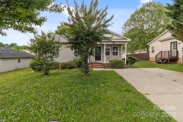 252 Sweet Bay Ln NW, Concord, NC 28027 - view of front facade with a front yard and a porch