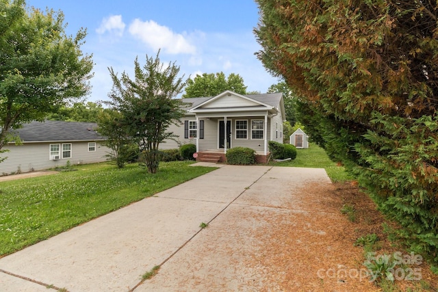 252 Sweet Bay Ln NW, Concord, NC 28027 - view of front of home featuring a front yard and a porch