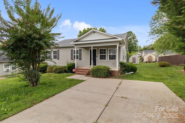 252 Sweet Bay Ln NW, Concord, NC 28027 - view of front of home with a front yard