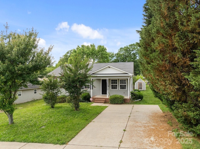 252 Sweet Bay Ln NW, Concord, NC 28027 - view of front of home with a porch and a front lawn