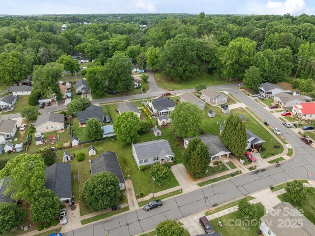 252 Sweet Bay Ln NW, Concord, NC 28027 - aerial view of residential area with a heavily wooded area