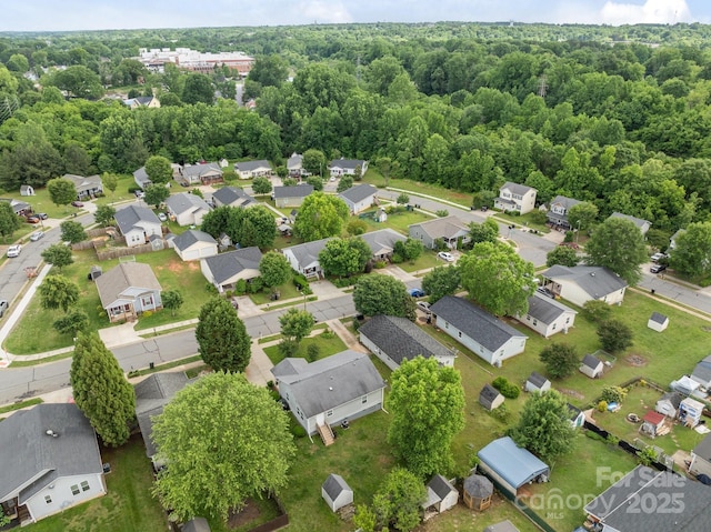 252 Sweet Bay Ln NW, Concord, NC 28027 - aerial perspective of suburban area featuring a heavily wooded area