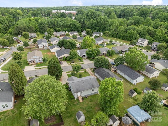 252 Sweet Bay Ln NW, Concord, NC 28027 - aerial view of residential area with a heavily wooded area