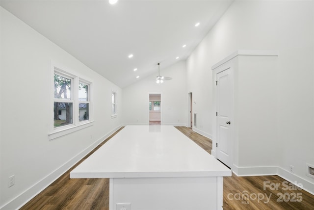 615 Irish Potato Rd, Concord, NC 28025 - unfurnished room featuring wood finished floors, recessed lighting, ceiling fan, high vaulted ceiling, and baseboards