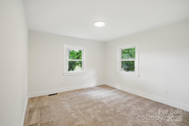 615 Irish Potato Rd, Concord, NC 28025 - carpeted spare room with healthy amount of natural light and baseboards