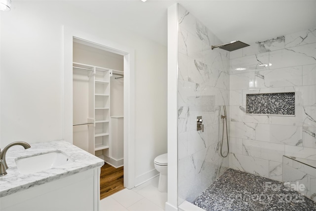 615 Irish Potato Rd, Concord, NC 28025 - full bath featuring a marble finish shower, toilet, a spacious closet, and vanity