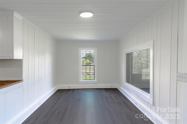 615 Irish Potato Rd, Concord, NC 28025 - empty room with dark wood-style flooring and baseboards