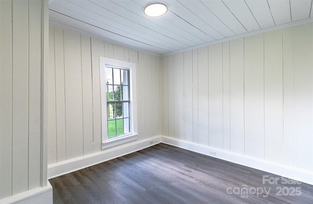 615 Irish Potato Rd, Concord, NC 28025 - unfurnished room featuring dark wood-style floors, baseboards, and wooden ceiling