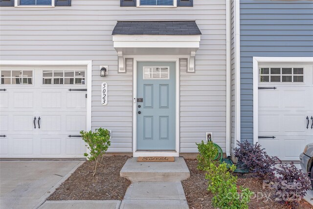 5023 Daybell St, Charlotte, NC 28214 - doorway to property featuring a garage