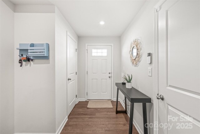 5023 Daybell St, Charlotte, NC 28214 - doorway with dark wood-style flooring, recessed lighting, and baseboards
