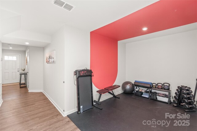 5023 Daybell St, Charlotte, NC 28214 - home theater room featuring recessed lighting, baseboards, and wood finished floors