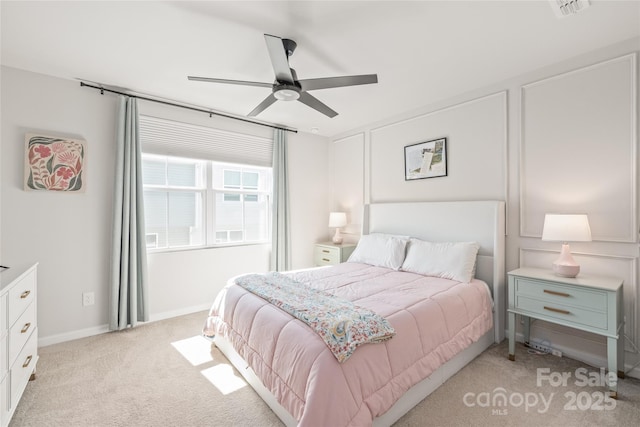 5023 Daybell St, Charlotte, NC 28214 - bedroom with light colored carpet, a ceiling fan, and baseboards