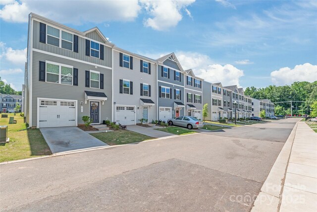 5023 Daybell St, Charlotte, NC 28214 - view of asphalt road featuring a residential view