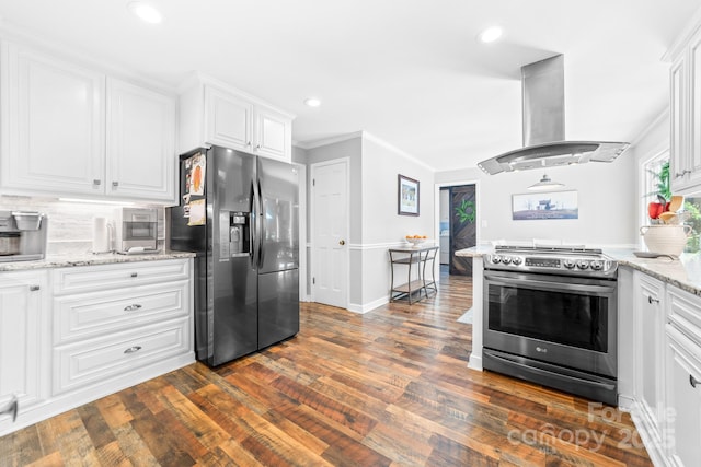 120 Labans Ln, Lincolnton, NC 28092 - kitchen featuring appliances with stainless steel finishes, island range hood, white cabinets, dark wood-style flooring, and tasteful backsplash
