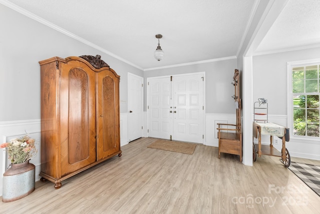 120 Labans Ln, Lincolnton, NC 28092 - entryway with light wood-type flooring, wainscoting, and crown molding