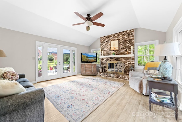 120 Labans Ln, Lincolnton, NC 28092 - living room featuring lofted ceiling, healthy amount of natural light, a ceiling fan, wood finished floors, and french doors