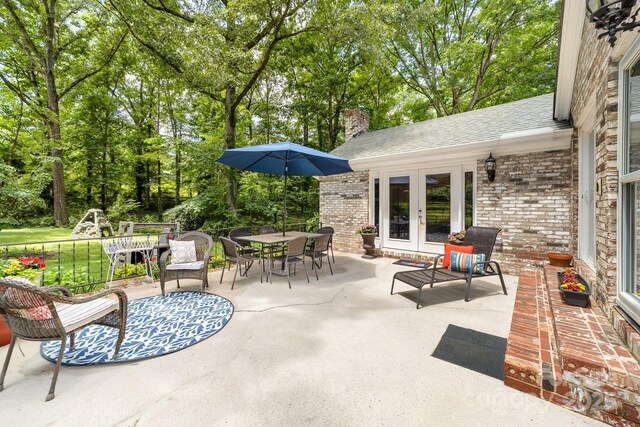 120 Labans Ln, Lincolnton, NC 28092 - view of patio / terrace featuring french doors and view of wooded area